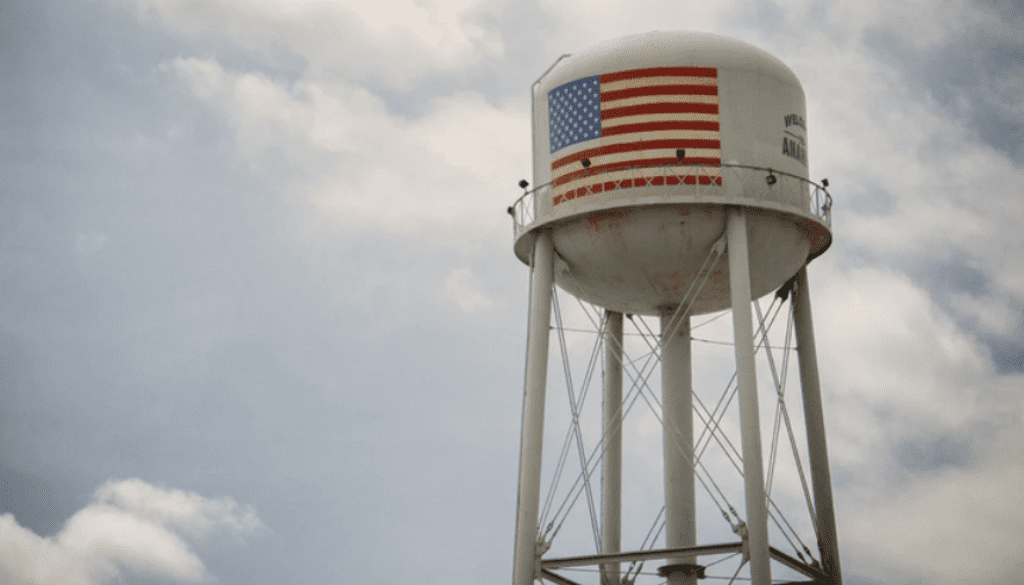 water tower with American flag on it